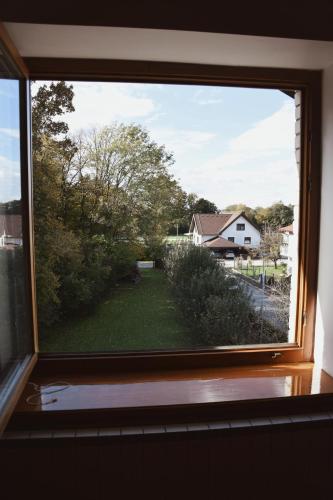 a window with a view of a yard at Rooms and Apartments Panker in Moravske Toplice