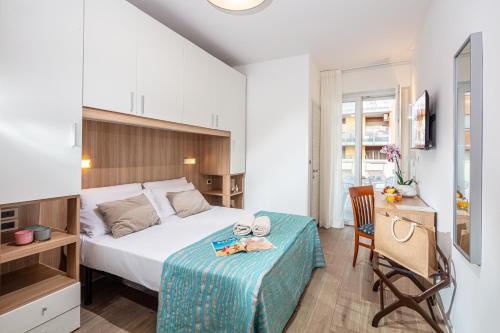 Posteľ alebo postele v izbe v ubytovaní Hotel Danieli