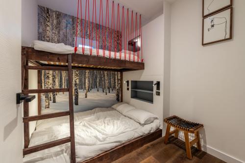 a bedroom with a bunk bed in a room at Sweet Home Brevent - Happy Rentals in Chamonix