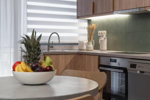 Kuchyň nebo kuchyňský kout v ubytování Num Suites & Lofts Athens