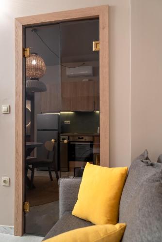 Kuchyň nebo kuchyňský kout v ubytování Num Suites & Lofts Athens