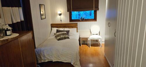 Postel nebo postele na pokoji v ubytování Villa Red House Arctic Circle