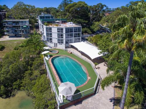 an aerial view of a hotel with a swimming pool at Mirage Hotel Newport in Newport