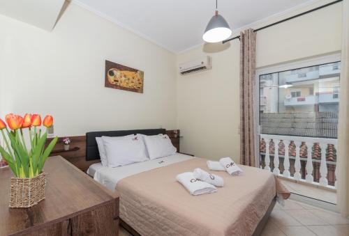 En eller flere senge i et værelse på Mira Apartment by "elite"