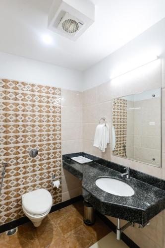חדר רחצה ב-Hotel Dolphin International