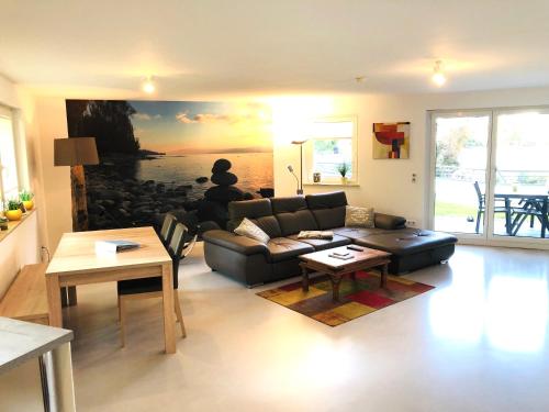Zona de estar de Ferienwohnung Uferresidenz