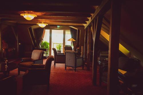 Coin salon dans l'établissement Ekesparre Boutique Hotel
