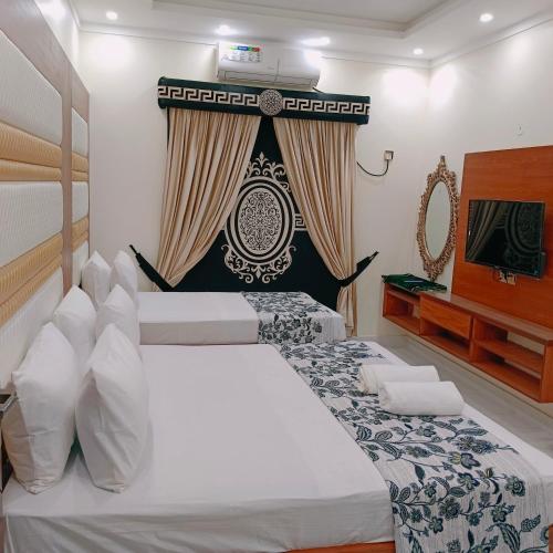 Cama ou camas em um quarto em ReziDor In Guest House