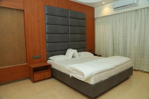 Postel nebo postele na pokoji v ubytování Hotel Sai D-lax