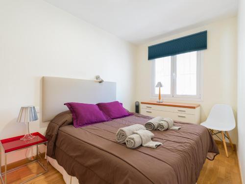 A bed or beds in a room at Lovely Peaceful Home By CanariasGetaway
