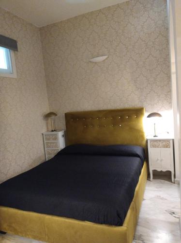 a bedroom with a large bed in a room at B&B Mini Hotel Incity-close train station and port- in Salerno