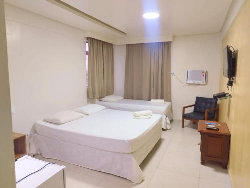 Katil atau katil-katil dalam bilik di Hotel Boa Viagem Aeroporto