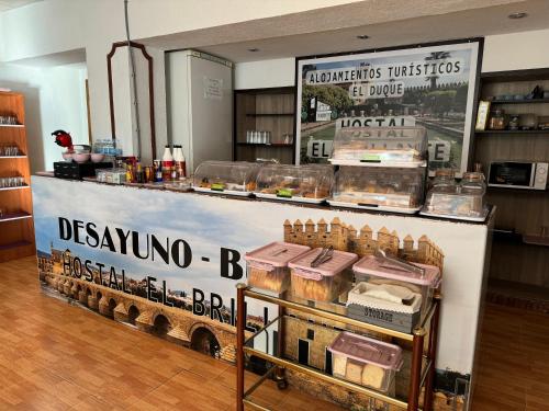 a display case in a store with a model of a train at Hostal El Brillante - Alojamientos El Duque in Córdoba