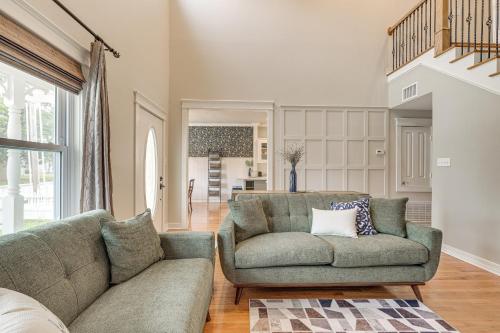 a living room with a couch and a chair at Brenham Rental with Deck and Yard Less Than 1 Mi to Downtown! in Brenham