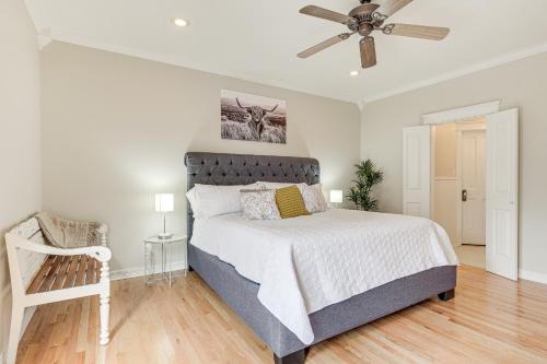 a bedroom with a bed and a ceiling fan at Brenham Rental with Deck and Yard Less Than 1 Mi to Downtown! in Brenham