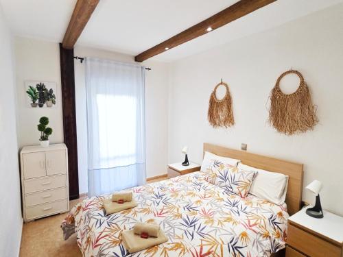 En eller flere senge i et værelse på BenalBeach Casa Kito