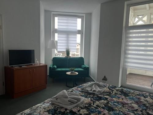 Ένα ή περισσότερα κρεβάτια σε δωμάτιο στο Hotel Villa Elisabeth