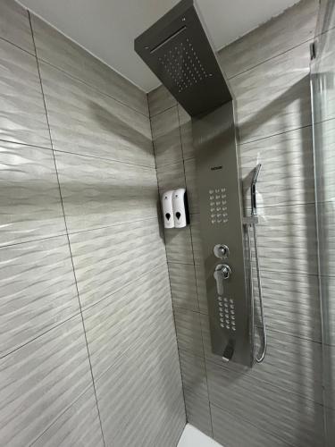 a shower with a glass door in a bathroom at Cotrades 1 En San Blas-Canillejas in Madrid