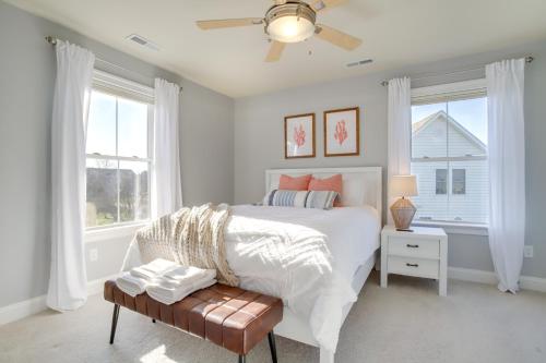 a bedroom with a white bed and a window at 4 Mi to Bethany Beach Frankford Getaway with Pool! in Frankford
