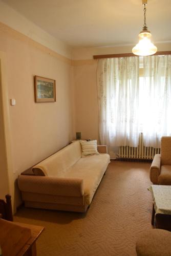 מיטה או מיטות בחדר ב-Guest House Tisza Ház