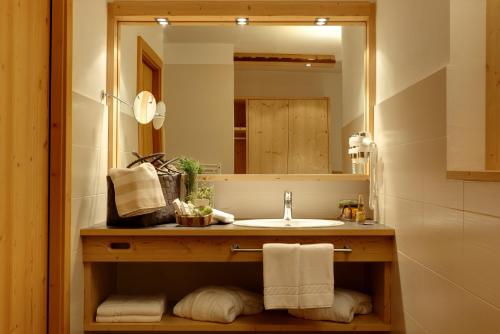 Ванная комната в Kräuterhotel Zischghof