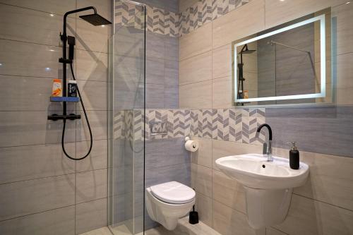 Ένα μπάνιο στο Apartments ALKANTARA