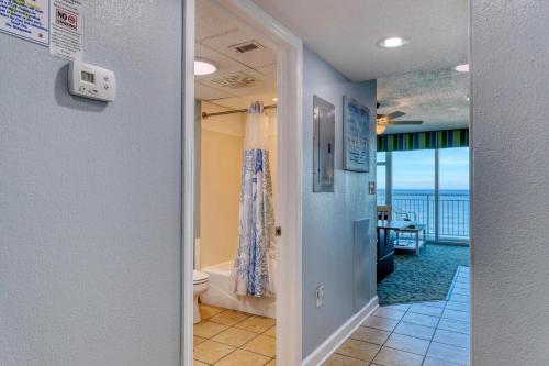 a bathroom with a toilet and a view of the ocean at 2501 S Ocean Blvd, 0505 - Ocean Front Sleeps 6 in Myrtle Beach