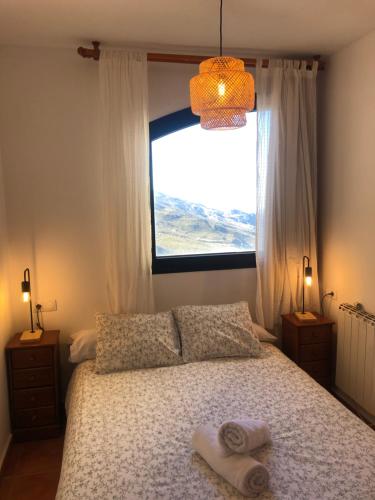 Postel nebo postele na pokoji v ubytování zona media apartamento confort monte oiz