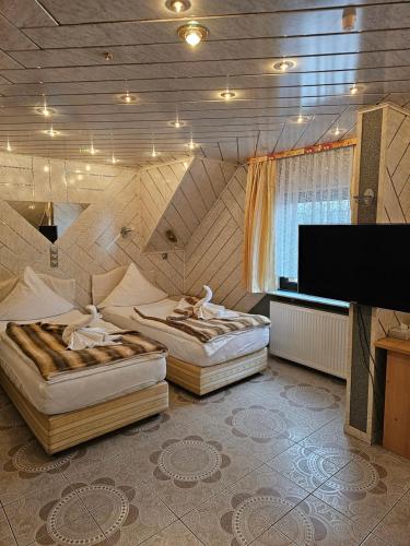 Μια τηλεόραση ή/και κέντρο ψυχαγωγίας στο Hotel Tenne