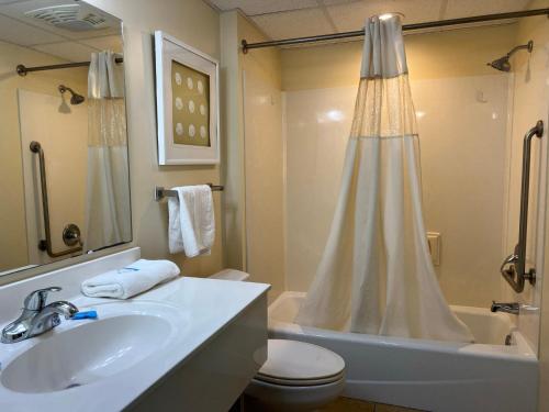 a bathroom with a sink and a toilet and a shower at 2501 S Ocean Blvd, 0811 - Ocean Front Sleeps 8 in Myrtle Beach