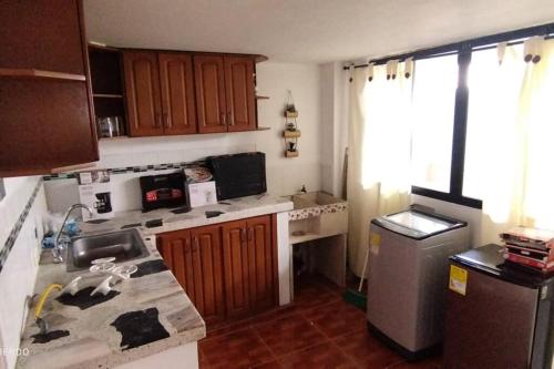 Majoituspaikan Apartamento MONACO Céntrico Tercer Piso sin ascensor keittiö tai keittotila