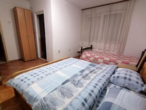 En eller flere senge i et værelse på Ohrid apartments