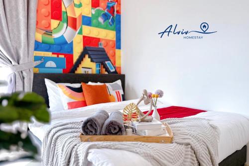 Una cama o camas en una habitación de The Shore Kids Wonderland I Family 6-10pax I Kids Friendly I JonkerSt