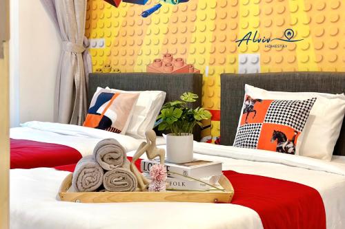 Una cama o camas en una habitación de The Shore Kids Wonderland I Family 6-10pax I Kids Friendly I JonkerSt