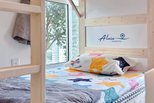 Una cama o camas en una habitación de The Shore Kids Wonderland I Family 6-10pax I Kids Friendly I JonkerSt