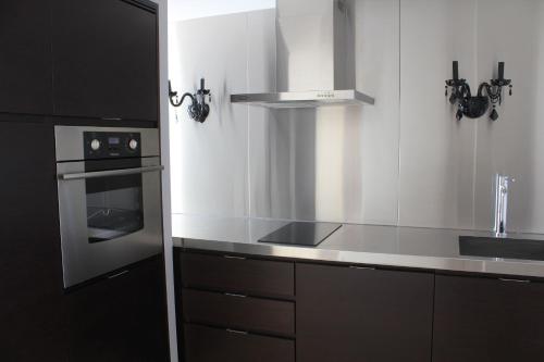 Yoo Punta del Este - Rental Club Apartmentsにあるキッチンまたは簡易キッチン