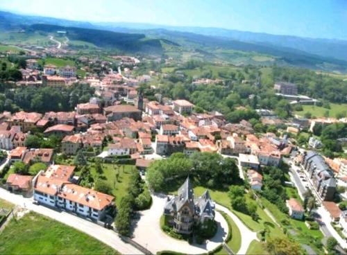 an aerial view of a small town with houses at Mima's House · La Casa de Mima in Comillas
