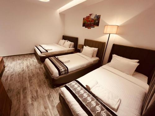 Voodi või voodid majutusasutuse Sanmoris Hotel toas