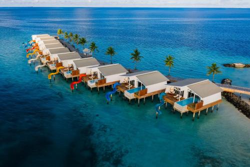 an aerial view of a resort on the water at Oaga Art Resort Maldives - Greatest All Inclusive in North Male Atoll