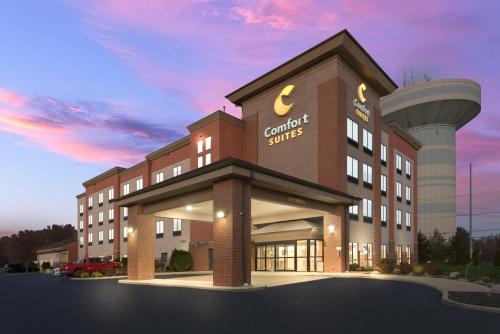a rendering of a hotel building with a control tower at Comfort Suites Columbus East Broad in Columbus