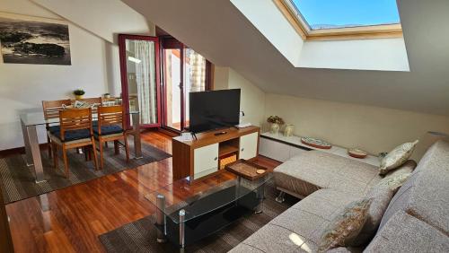 TV a/nebo společenská místnost v ubytování Apart 52 m2 en Sabaris-Baiona