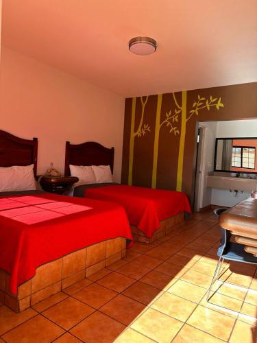 Katil atau katil-katil dalam bilik di Hotel Colonial de Nogales