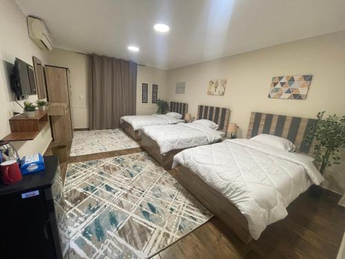 Postel nebo postele na pokoji v ubytování Malek Pyramids Guest House