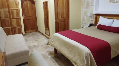 Katil atau katil-katil dalam bilik di Cancun International Suites