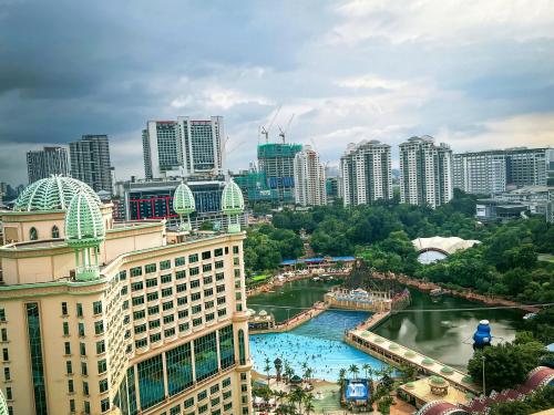 a view of a city with a river and buildings at Resort Suites at Bandar Sunway in Petaling Jaya
