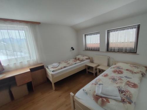 Ένα ή περισσότερα κρεβάτια σε δωμάτιο στο Bed & Breakfast Hisa Resje