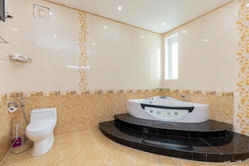 Et badeværelse på Sala Pool Villa