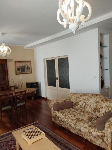 a living room with a couch and a table at Cà Del Dose in Venice