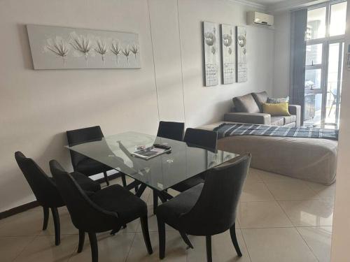 Ένα ή περισσότερα κρεβάτια σε δωμάτιο στο Umhlanga Ridge Luxury 2bed Self Catering Apartment