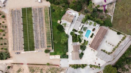 an overhead view of a building with solar panels at Sa Talaia Blanca in Muro